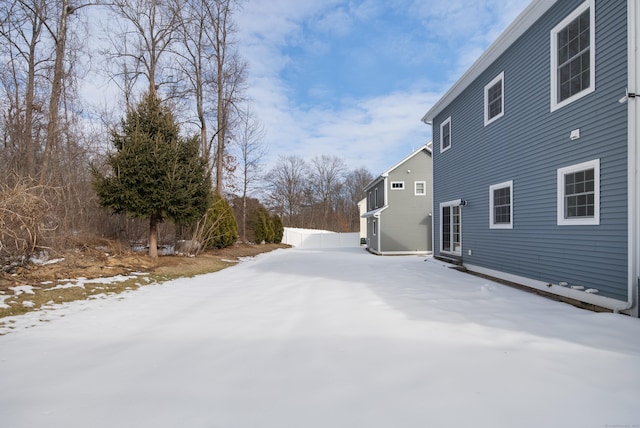 view of yard covered in snow