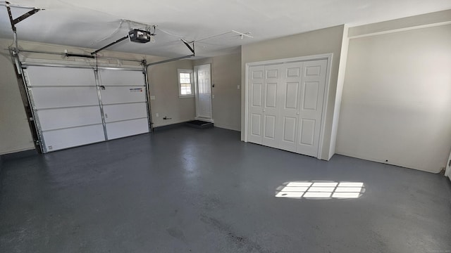 garage featuring a garage door opener