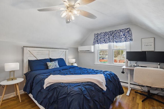 bedroom featuring lofted ceiling, a wall mounted air conditioner, and wood finished floors