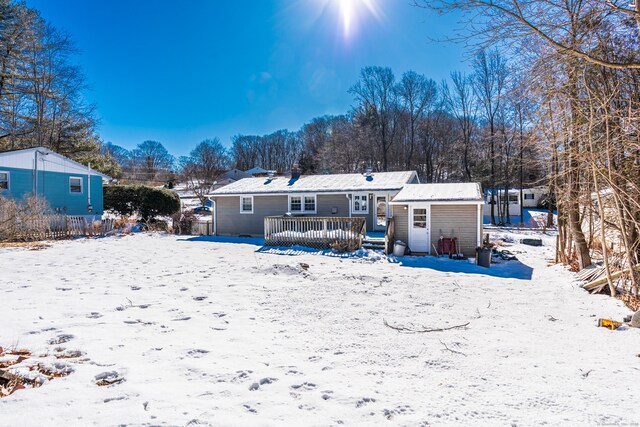 view of snow covered house