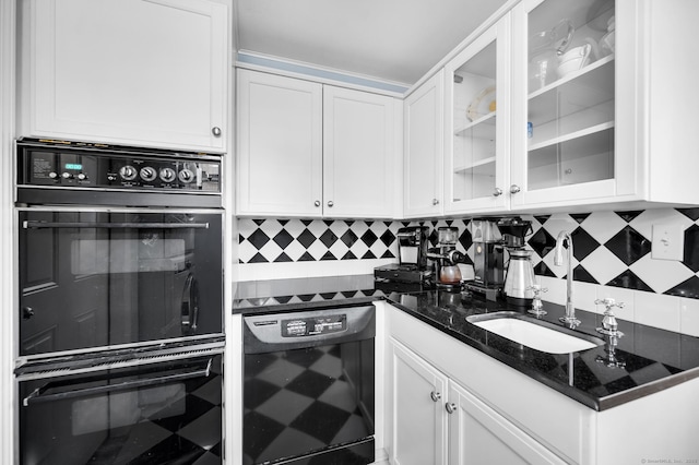 kitchen with beverage cooler, tasteful backsplash, white cabinetry, and dobule oven black