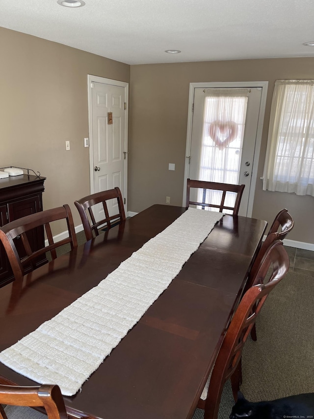 dining room with baseboards