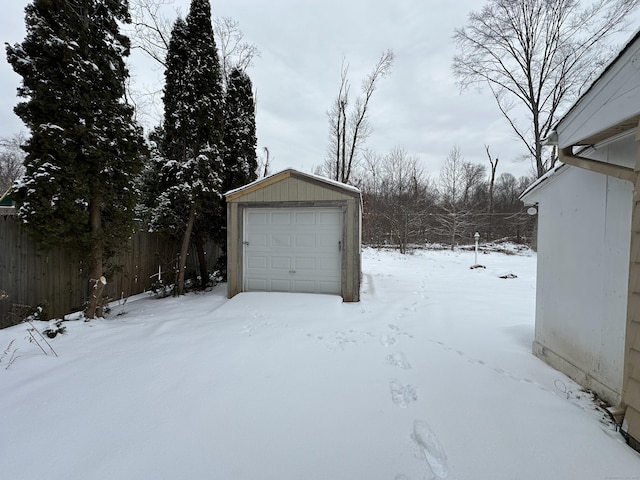 159 Tom Swamp Rd, Hamden, CT 06518 - snow covered garage with a detached garage and fence