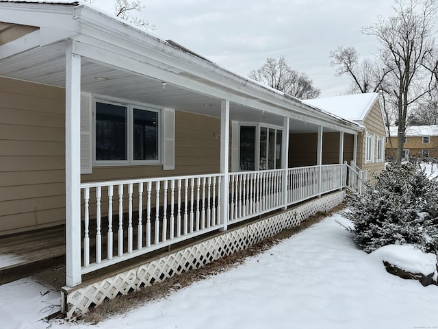 159 Tom Swamp Rd, Hamden, CT 06518 - view of snow covered exterior featuring covered porch