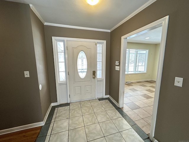 159 Tom Swamp Rd, Hamden, CT 06518 - entrance foyer with ornamental molding, baseboards, and light tile patterned floors