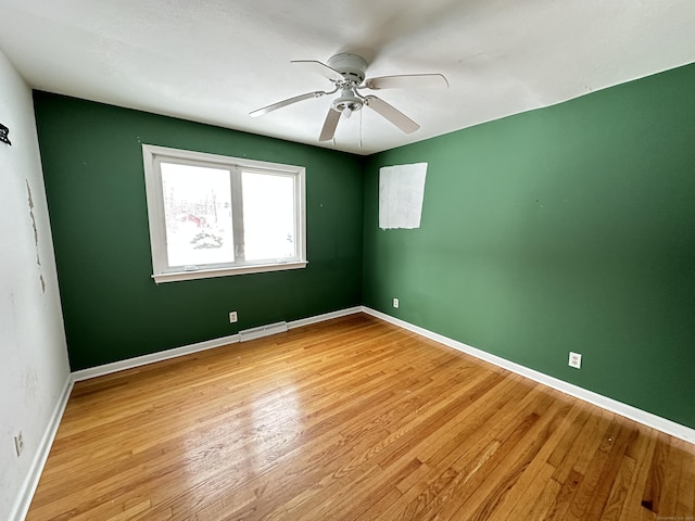 159 Tom Swamp Rd, Hamden, CT 06518 - empty room featuring a ceiling fan, baseboards, visible vents, and wood finished floors