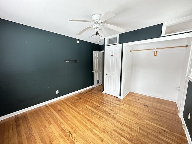 159 Tom Swamp Rd, Hamden, CT 06518 - unfurnished bedroom with a ceiling fan, baseboards, and light wood finished floors