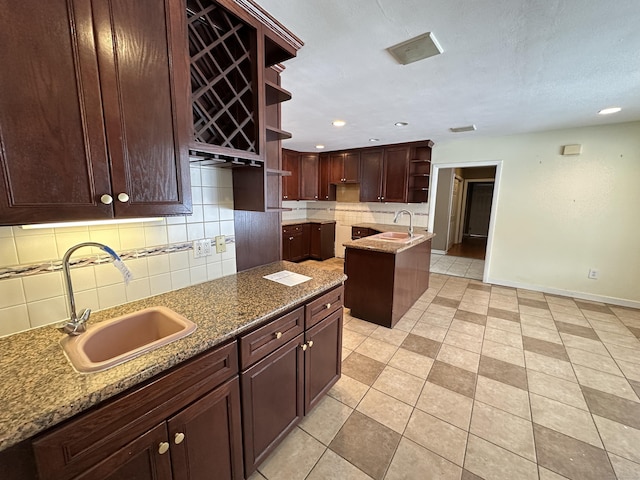 159 Tom Swamp Rd, Hamden, CT 06518 - kitchen featuring tasteful backsplash, a sink, baseboards, and open shelves