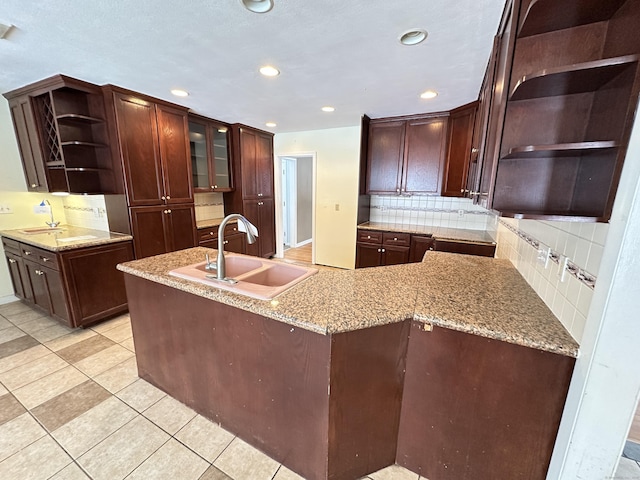 159 Tom Swamp Rd, Hamden, CT 06518 - kitchen with tasteful backsplash, a peninsula, open shelves, a sink, and recessed lighting