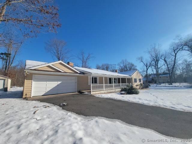 159 Tom Swamp Rd, Hamden, CT 06518 - ranch-style house featuring covered porch, aphalt driveway, and a garage