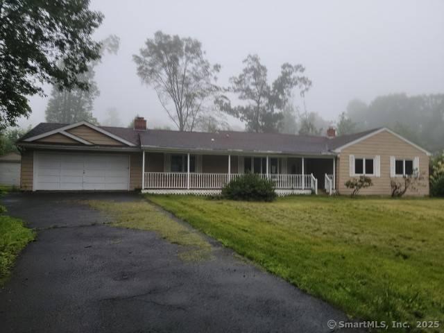 159 Tom Swamp Rd, Hamden, CT 06518 - single story home featuring covered porch, an attached garage, a front lawn, and a chimney