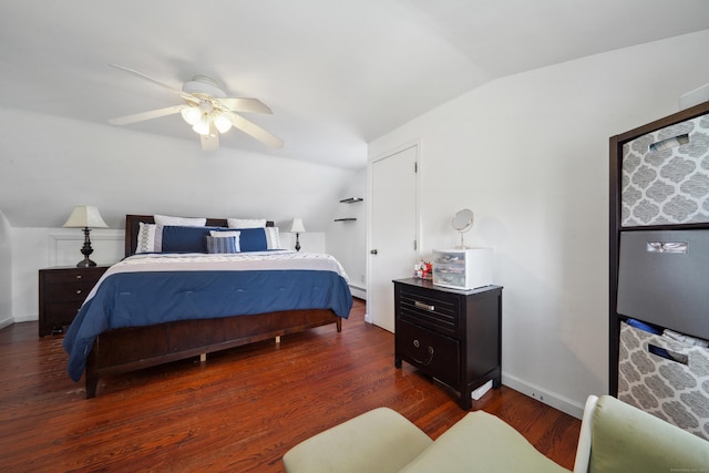 bedroom featuring ceiling fan, baseboards, lofted ceiling, and wood finished floors