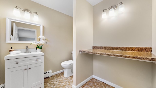 bathroom featuring baseboards, toilet, a baseboard radiator, vanity, and a baseboard heating unit