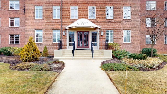 view of front facade featuring brick siding