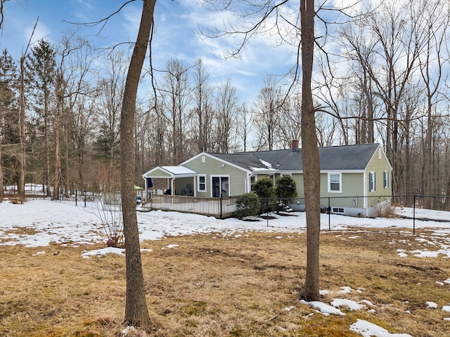 view of front of home featuring a chimney