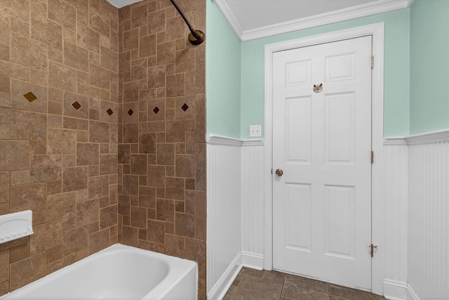 full bathroom featuring shower / washtub combination, crown molding, and wainscoting