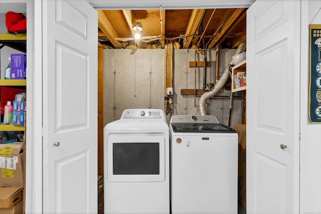 washroom with laundry area and washing machine and dryer