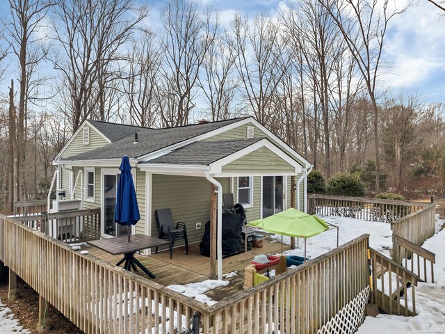 view of snow covered deck