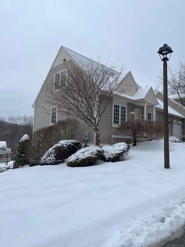 view of front of property with a garage