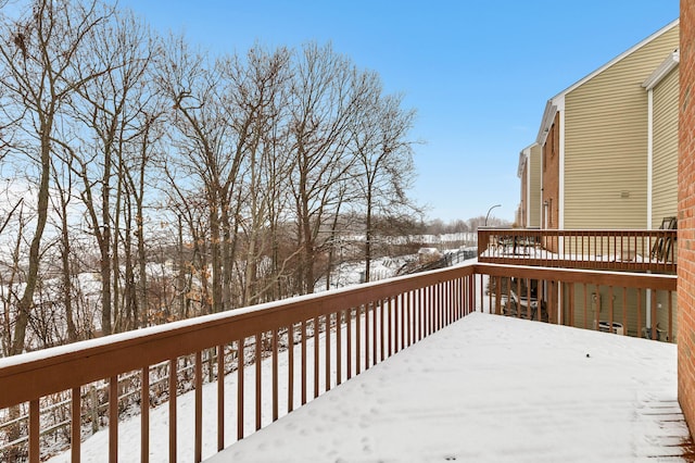 view of snow covered deck