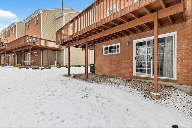 exterior space with brick siding