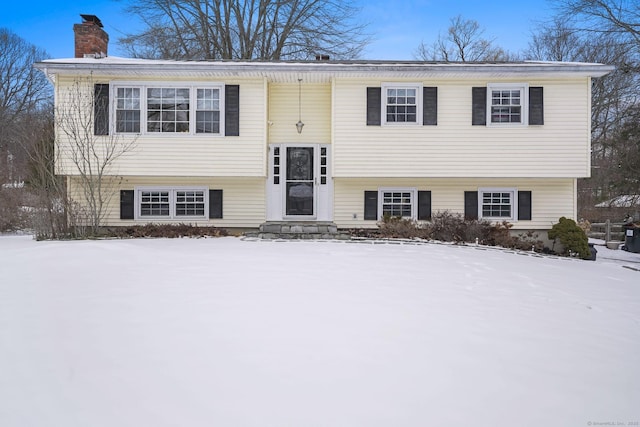 split foyer home with a chimney