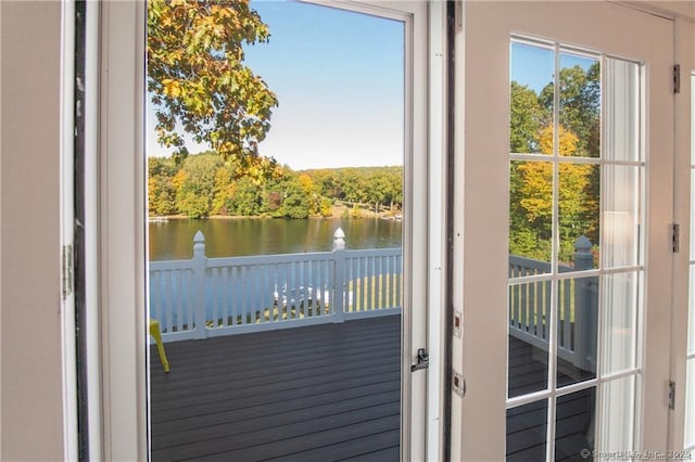 entryway featuring a water view