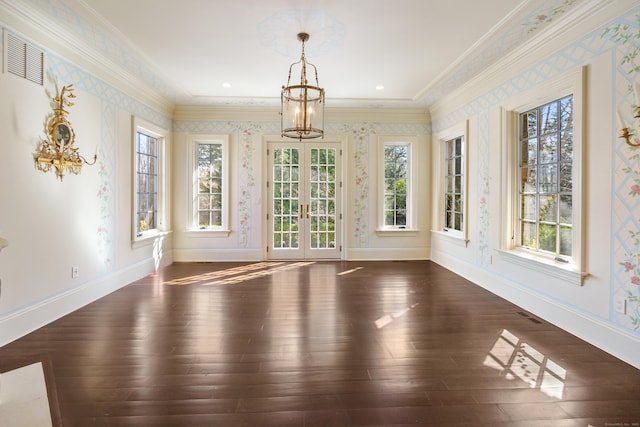 interior space featuring french doors, visible vents, and an inviting chandelier