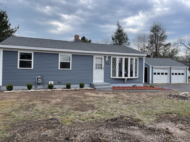 324 Maple St, Branford, CT 06405 - ranch-style house featuring a chimney, a shingled roof, driveway, an outbuilding, and a garage
