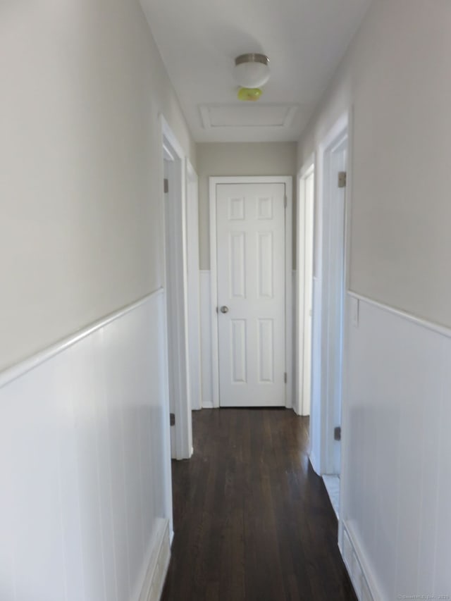 324 Maple St, Branford, CT 06405 - corridor featuring attic access, dark wood-style floors, and wainscoting