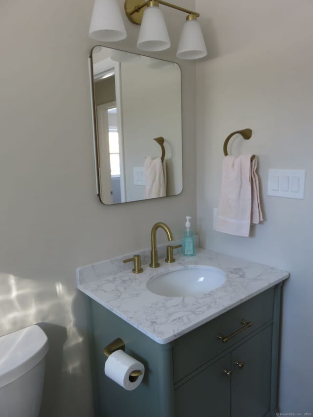 324 Maple St, Branford, CT 06405 - bathroom featuring toilet and vanity