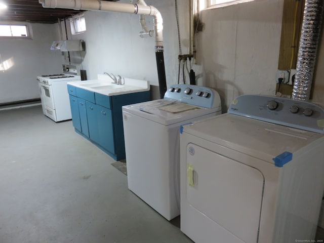 324 Maple St, Branford, CT 06405 - clothes washing area featuring cabinet space, a sink, and separate washer and dryer