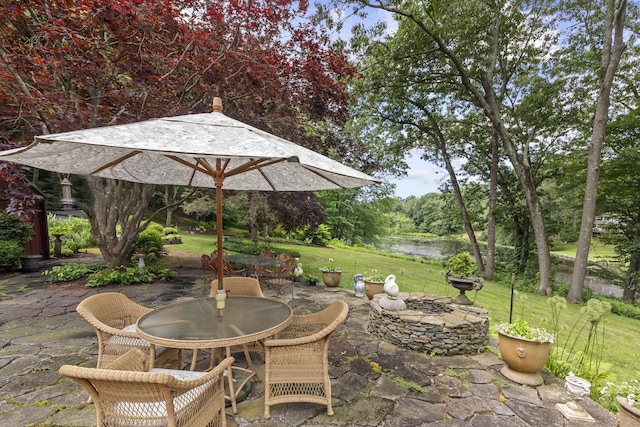 view of patio featuring outdoor dining space