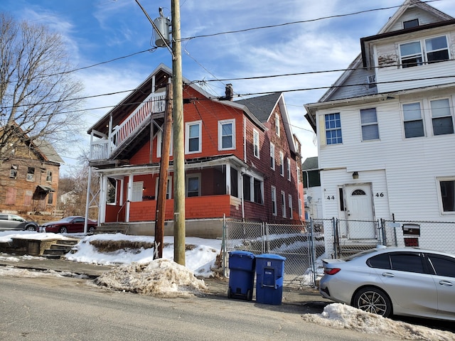 view of front of house with fence