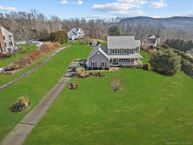 bird's eye view featuring a forest view