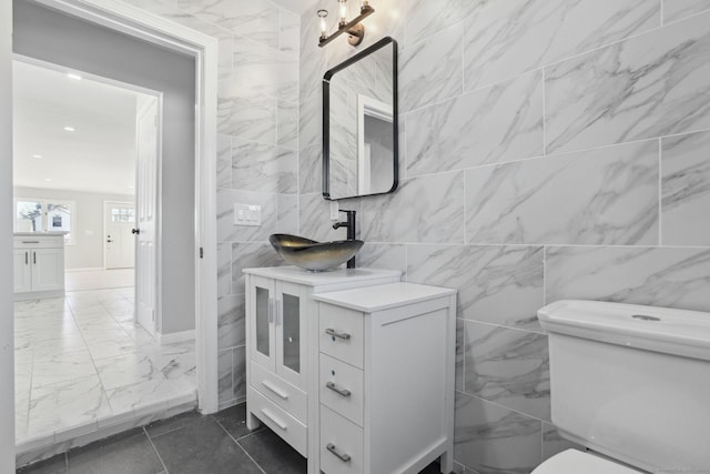 bathroom featuring toilet and a sink