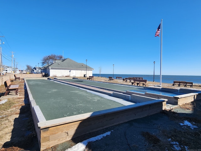 view of property's community featuring a water view