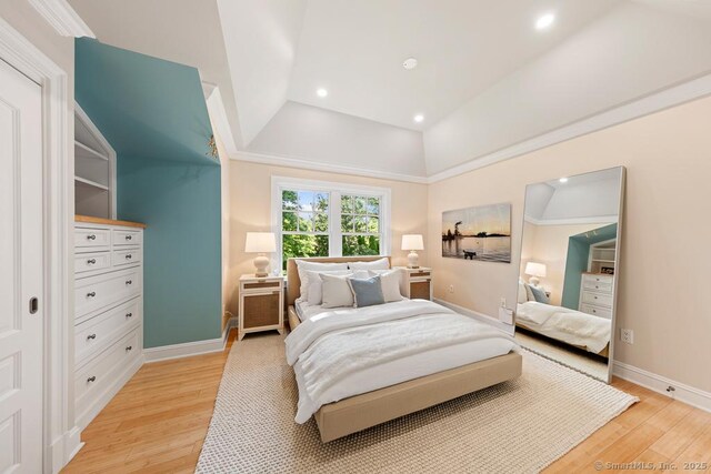 260 Hillspoint Rd, Westport, CT 06880 - bedroom with light wood-type flooring, vaulted ceiling, baseboards, and recessed lighting