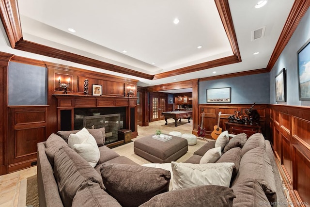 260 Hillspoint Rd, Westport, CT 06880 - cinema room featuring a wainscoted wall, visible vents, a tray ceiling, a glass covered fireplace, and crown molding