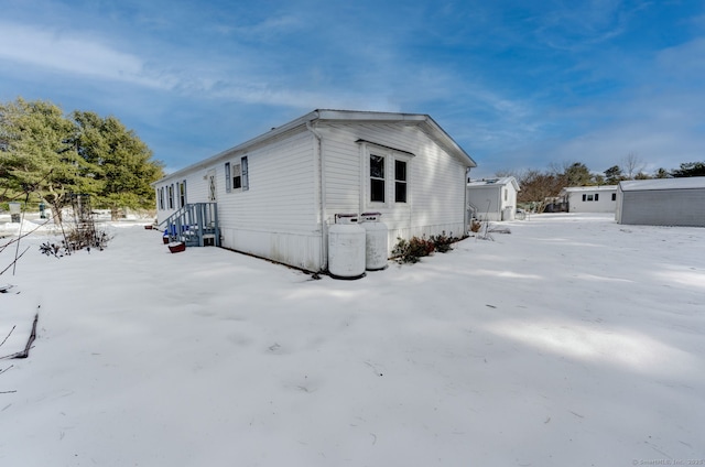 view of snow covered property