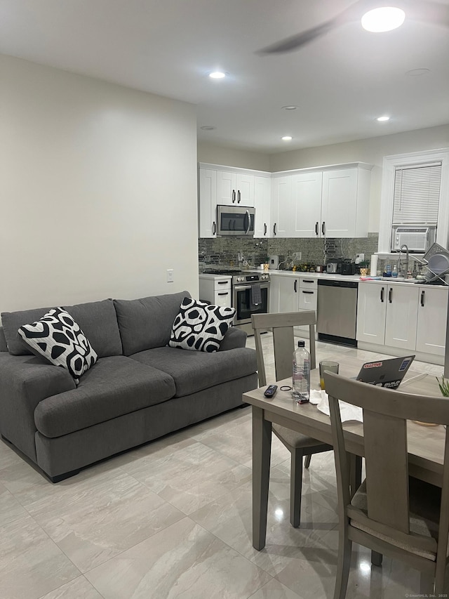 living area with recessed lighting