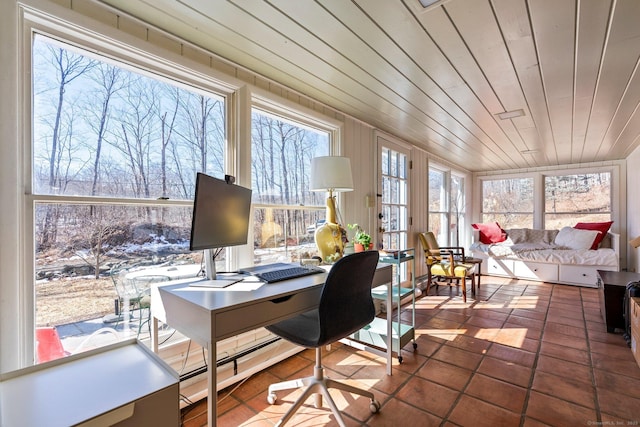 office space featuring tile patterned flooring, wood ceiling, and a healthy amount of sunlight