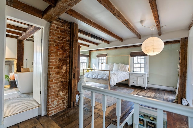 unfurnished bedroom featuring a baseboard radiator, brick wall, wood-type flooring, and beamed ceiling