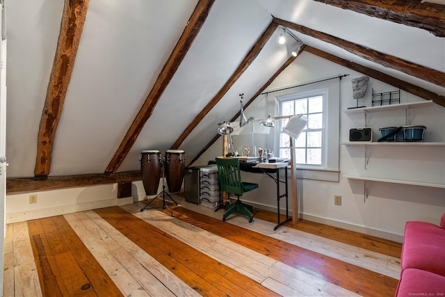 bonus room with baseboards, vaulted ceiling with beams, and wood-type flooring