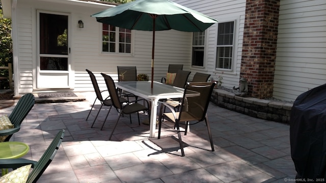 view of patio featuring outdoor dining area and area for grilling