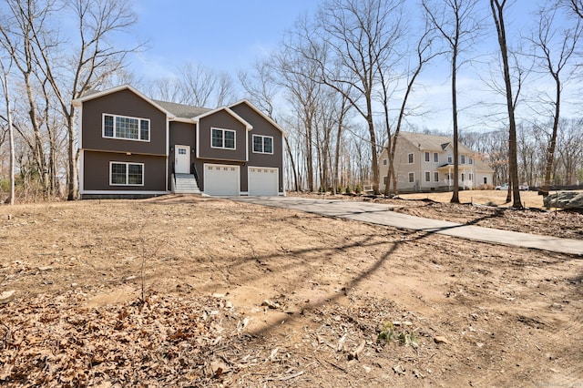 view of front of house featuring a garage and driveway