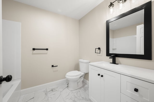 bathroom featuring baseboards, toilet, marble finish floor, and vanity