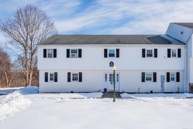 view of front of home featuring brick siding