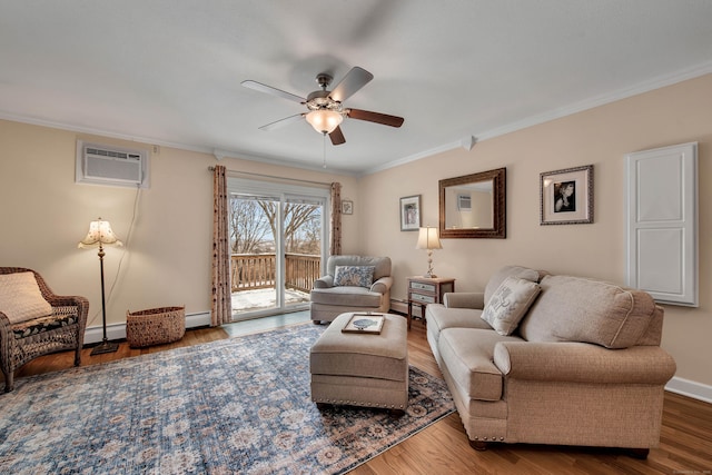 living room with crown molding, baseboard heating, and wood finished floors