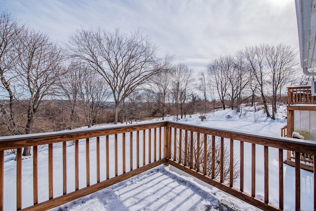 view of snow covered deck